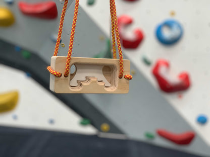 Ergo portable hangboard full view showing dual ergonomic and standard edge design in cross-grain birch plywood