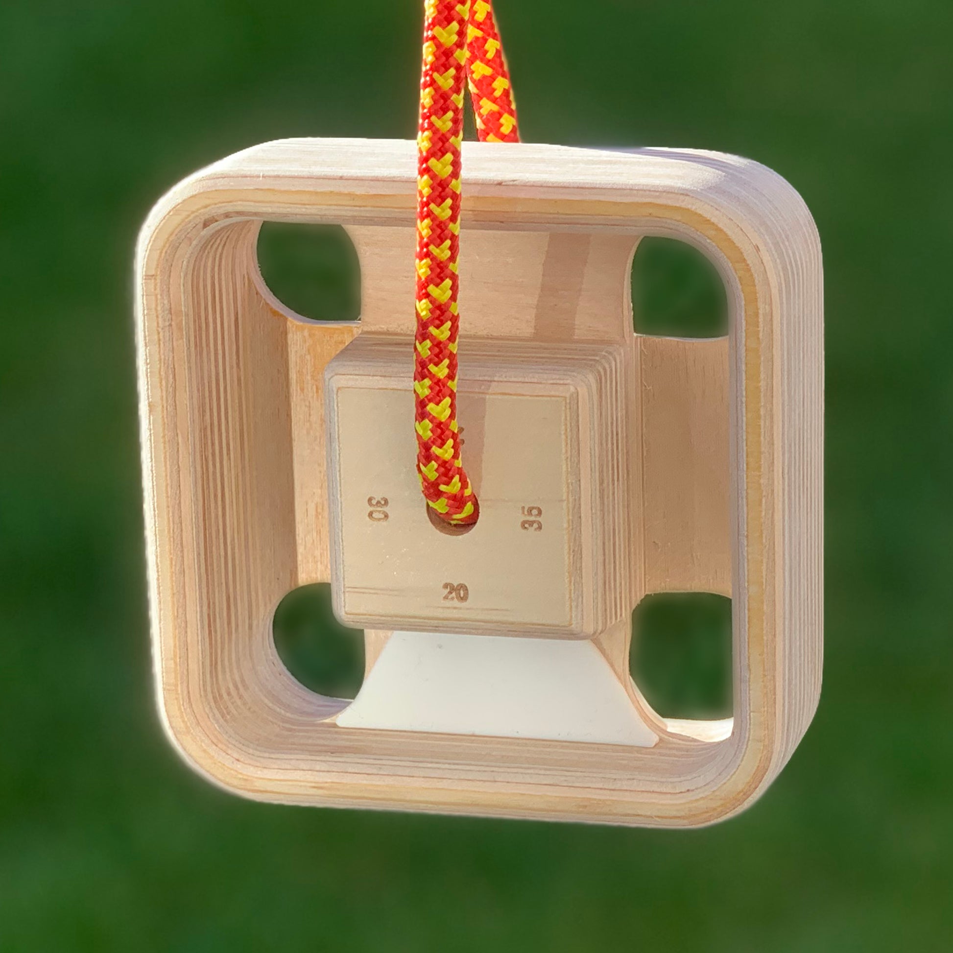 Single MegaEdge portable hangboard shown outdoors highlighting birch plywood edges and pinch grips for rock climbing training